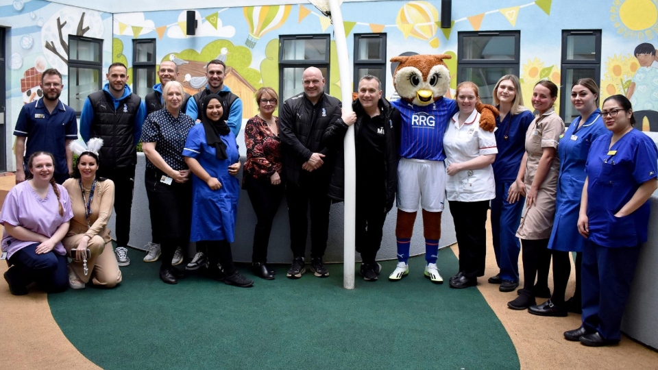 The Latics party pictured at the Royal Oldham Hospital
